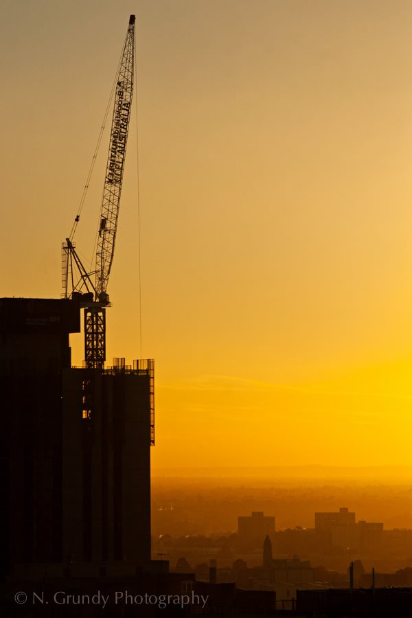 Sunset Crane by Construction Photographer in Ireland