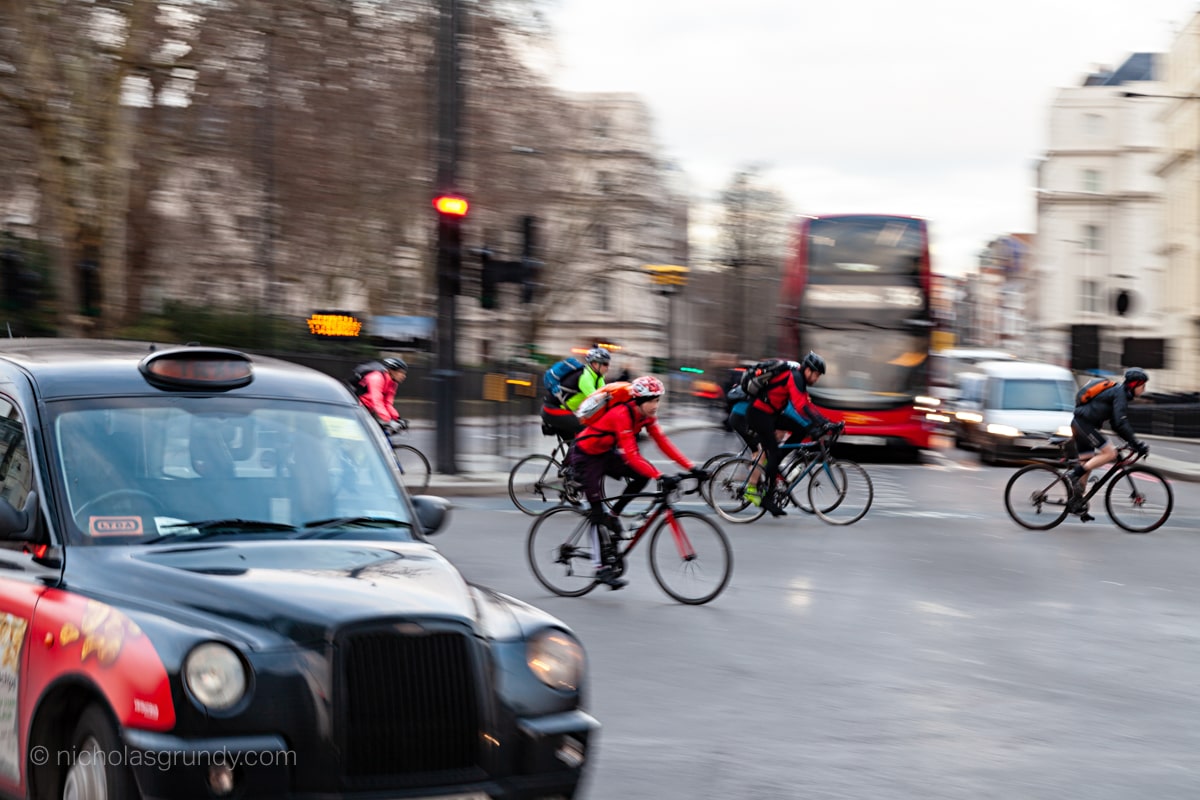 London Cyclists, Taxi and Double Decker Bus Photo